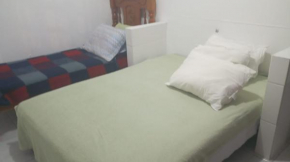 Casa pé na área